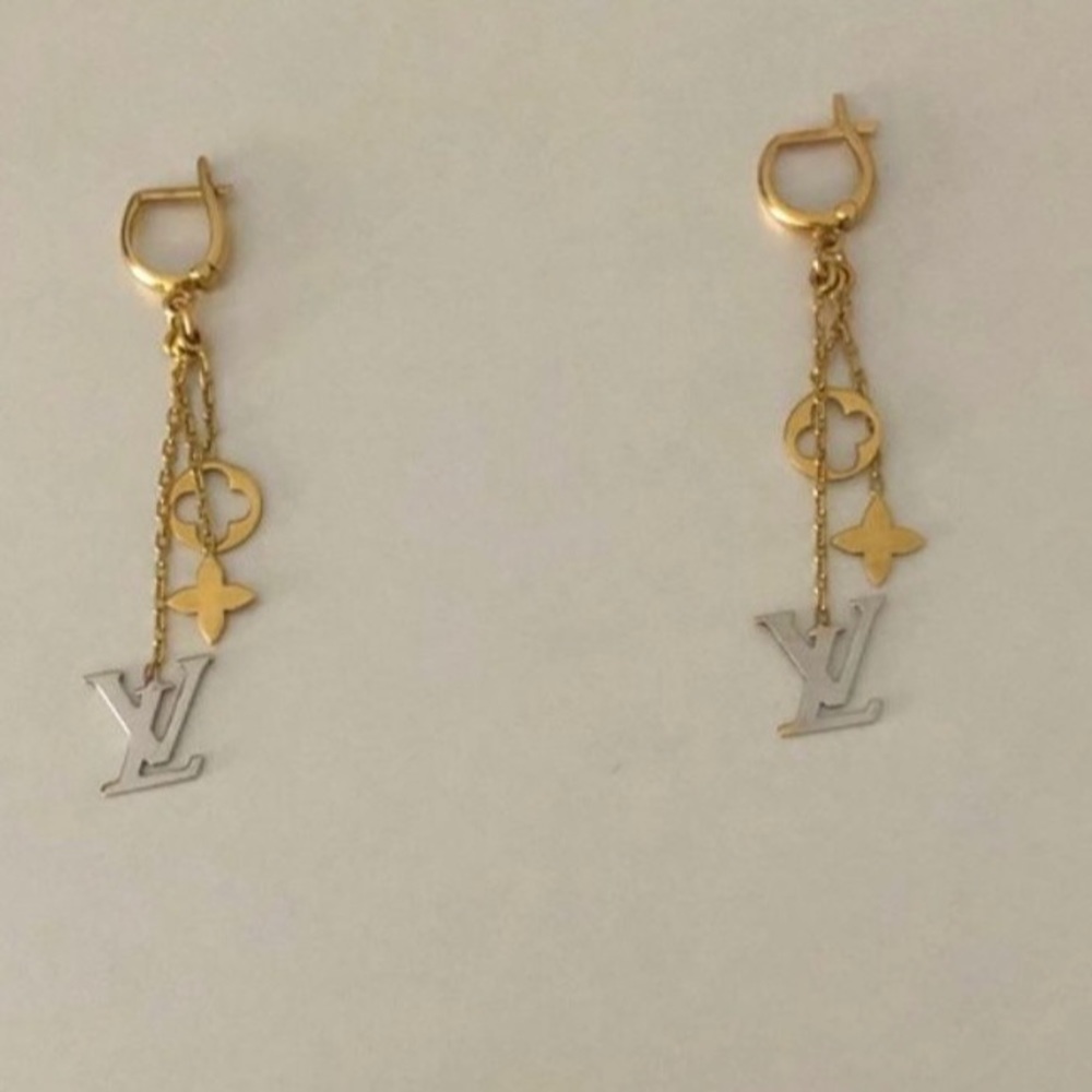 Rare to find 585 stamped gold LV earrings